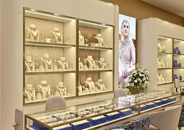 Lit shelves of gold necklaces at Indriya Nexus Seawoods