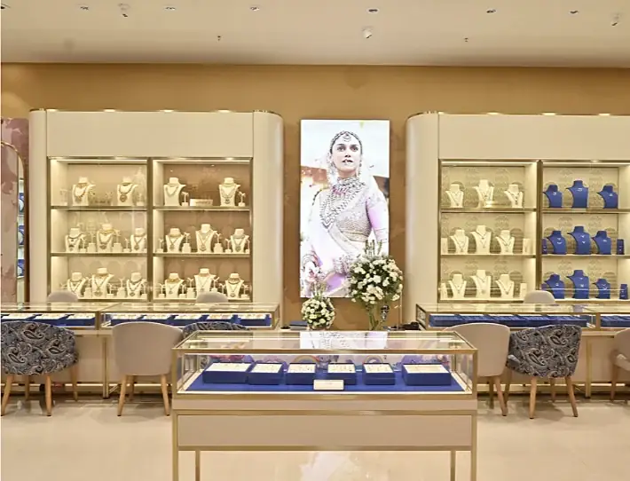 Display wall and glass counter at Indriya Nexus Seawoods
