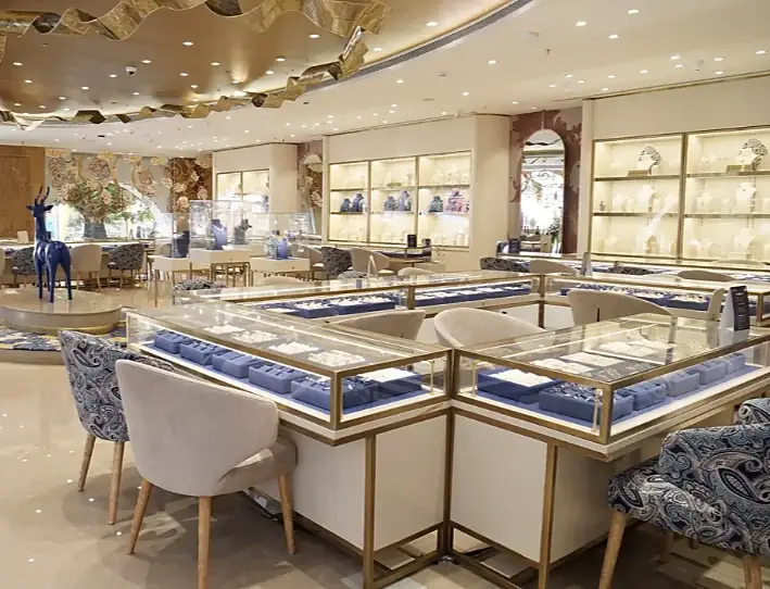 Jewellery counters and seating under a gold ceiling at Indriya Sky City Mall