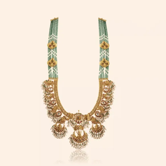 Vinayaka gold bridal necklace with green bead strands and a cluster of temple jhumka drops